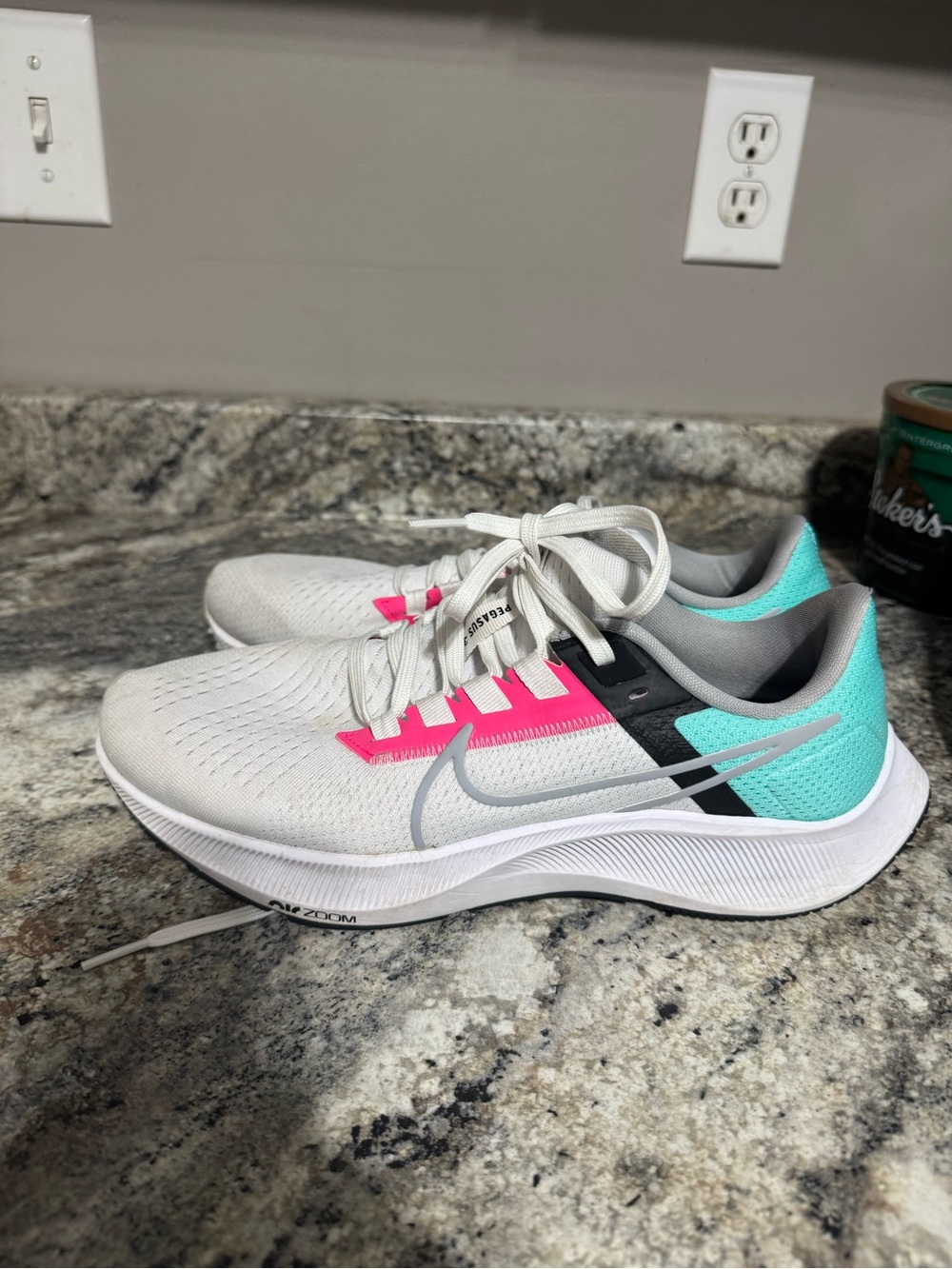Nike Women’s White Running Shoes with Teal & Pink Accents